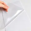 Suministrado directamente por el fabricante: Película de laminación en frío láser A4, película BOPP transparente autoadhesiva, película protectora para álbum de fotos