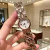 Nuevo Usado Vintage Pequeño Reloj de Oro Familia D Mismo Estilo D Cuadrícula de Diamantes Estilo Coco Chanel Movimiento de Cuarzo Reloj para Mujer Modelo de Reloj Mayoreo
