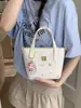 Bolso Pequeño Estilo Cesta con Estampado Floral Dulce para Mujer, Nuevo Modelo 2026, Bolso de Mano para el Trabajo, Bolso Cubo, Bolso Cruzado Versátil para Principios de Primavera