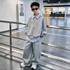 Ropa de Otoño para Niños Conjunto de Camisa Azul a Rayas Cuello Set 2026 Otoño Nuevo Estilo Coreano Fresco Niño Grande Camisa Polo Conjunto de Dos Piezas