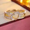 Anillo bestseller transfronterizo con forma de corazón hueco con circonita, diseño de corazón cruzado de doble capa, anillo versátil de lujo de alta gama