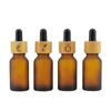Botella de aceite esencial de madera de bambú de 10 ml, anillo marrón esmerilado, gotero de cabeza de plástico, subbotella, tapa de madera de bambú, botella pequeña portátil para muestras cosméticas