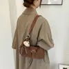Bolso bandolera de un solo hombro fresco y dulce para mujer, bolso de mano de cuero suave de alta gama, nuevo bolso versátil de moda 2026 para el día a día