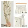 Pantalones de pijama estampados de estilo nacional frescos para mujer, pantalones de pierna ancha cropped finos de seda helada para verano, adecuados para usar al aire libre y en casa