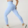 Calça de yoga feminina sem costura, de cintura alta, que levanta o bumbum e afina a silhueta, perfeita para corrida, fitness e treinos, com elasticidade aprimorada