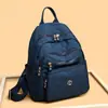 Moda Transfronteriza 2026 Nuevo Tejido de Nailon para Mujer Mochila Versátil de Gran Capacidad Mochila de Viaje Escolar Ligera y Moderna