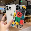 Aliexpress Carita Sonriente Graffiti Colorido Adecuado para iPhone 17 Funda de Teléfono Personalizada Apple 18Pro Cubierta Protectora Transparente