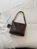 Venta al por mayor transfronteriza de bolsos nuevos para mujer: bolsos tote tipo cubeta con patrón tejido retro de moda, bolsos de hombro para llevar debajo del brazo a la moda y bolsos cruzados para mujer