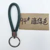 Cordón de cuero simple cuerda redonda PU llavero soporte para llaves de coche accesorio colgante para bolso anillo redondo colgante de regalo