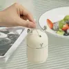 Dispensador automático de palillos de dientes, de alta gama y elegante, con un diseño único y creativo, que presenta un lindo motivo de ciervo en una paleta de colores cremosos, perfecto para uso doméstico y popular entre los influencers en línea.