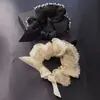 Accesorios para el cabello nuevos de primavera y verano al por mayor Anillo para el cabello con lazo de organza Cuerda para la cabeza simple para mujer Banda de goma Cubierta de cuero