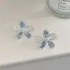 "Historia Floral Tono Azul" Elegancia Francesa de Alta Gama Suave Diseño de Nicho Hueco Azul Niebla Cristal de Hielo Pendientes Clips para Oreja