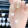 Aguja de plata 925 puesto mercado nocturno suministro aretes moda mujer asimétricos populares explosiones japonesas y coreanas aretes al por mayor A