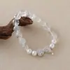 Pulsera de cristal fantasma blanco diy hecha a mano con cuentas redondas al por mayor pulsera de cristal natural joyería explosiva nueva