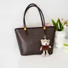 Bolso de mano retro transfronterizo de gran capacidad, simple, color sólido, textura de alta calidad, para ir al trabajo, bolso de un solo hombro, cuero suave, estilo coreano, bolso de mano