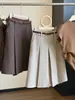 Saia plissada de lã estilo coreano para terno feminino, outono novo, cintura alta, emagrecedora, rejuvenescedora, saia evasê, comprimento médio