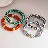 Pulseras Redondas de Acrílico Estampado Transfronterizas Europeas y Americanas, Pulseras de Moda, Sencillas, Personalizadas, Versátiles con un Diseño Único, Accesorios de Mano de Nicho