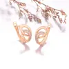 Pendientes Xuping de estilo retro con doble aro y forma de lágrima D, hechos de aleación de cobre, con un diseño hueco de moda y una estética única y de nicho, para mujer