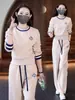 2025 novo terno estampado com combinação de cores estilo estrangeiro feminino primavera e outono moda casual suéter curinga calça de perna larga conjunto de duas peças