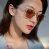Gafas de sol cibernéticas rojas de TikTok de estilo coreano para mujer, tendencia 2021, nuevas gafas de sol de moda con montura pequeña ovalada de té con fotografía callejera