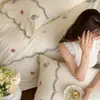 Ropa de cama fresca y delicada bordada 100% algodón, amigable con la piel y cálida, disponible en tamaños individual y matrimonial, tela de algodón puro cepillado, un juego de tres o cuatro piezas, con diseño de flor de jazmín