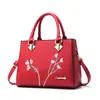 Bolsa de cuero PU recomendada para comercio exterior para mujer 2021 nueva bolsa para mujer bolso de mano gran capacidad un solo hombro bandolera primera generación