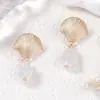 Brincos Pendentes de Liga Metálica com Concha e Pérola Imitação Estilo Oceano de Férias Elegante de Luxo Leve Transfronteiriços Versáteis Casuais Femininos