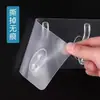 Ganchos adhesivos sin taladro para colgar ropa y toallas detrás de la puerta, transparentes y sin dejar rastro, diseño de múltiples ganchos