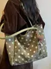Bolso de mano único y elegante de lunares para mujer, nuevo bolso de hombro casual de moda 2026, bolso de gran capacidad para el trabajo