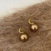 Pendientes de perlas de champán de lujo ligeros de alta calidad para mujer, elegantes, retro, exquisitos, con personalidad de moda, que combinan con todo.