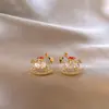 Aretes de Micro-Embebido tipo Troyano de Moneda para Mujer 2025 Nuevo Estilo Caliente Lujo Accesible Aretes de Gama Alta Diseño de Nicho Aretes Exquisitos