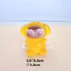 Perro tumbado explosivo estéreo luminoso Lilith accesorios de resina diy paisaje en miniatura colgante de coche transmisión en vivo bolsa ciega par