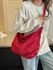 Bolso de mano de alta gama, exquisito para mujer, nuevo modelo 2026, bandolera de correa ancha, bolso casual y moderno de tela simple tipo albóndiga