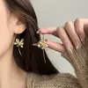 Nuevos Pendientes de Flor de Lirio Estilo Chino Moda Personalidad Diseño Nicho Simple Retro Lujo Ligero Pendientes de Gama Alta Venta al por Mayor