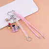 Llavero Colgante Cámara Colorida Miu Hebilla en Forma de Corazón Dados Cuerda Trenzada Decorativa Colgante Creativo Personalizado para Bolsa