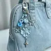 Exquisito Trébol de Cuatro Hojas Hecho a Mano DIY Colgante para Llavero Corazón Femenino Estilo Ins Accesorios Populares Colgante para Bolsa Venta al por Mayor