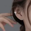 Clip para Oreja de Diamante Estrella sin Agujeros para las Orejas Temperamento Coreano para Mujer Personalidad Brilla por todo el Cielo Aretes de Estrella Colgante para Oreja Super Hada Sentido Exquisito