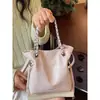 Bolsa de Corrente Texturizada Minimalista para Mulheres 2026 Nova Bolsa Transversal de Nicho Moda para o Dia a Dia Bolsa de Ombro Transfronteiriça