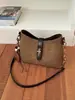 Bolsa vintage esmerilada de otoño e invierno para mujer, nuevo bolso cruzado versátil de moda 2026, bolso de hombro tipo cubo popular para ir al trabajo