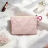 Bolso de mano acolchado plateado con forma de corazón, monedero y neceser de viaje portátiles estilo INS transfronterizo