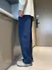 Pantalones rectos holgados de mezclilla vintage lavados en azul para hombre, nueva colección de otoño 2026, versátiles pantalones largos casuales negros, modernos