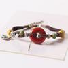 Joyería de cerámica pulsera dulce hebilla pulsera tejido ajustable estudiante femenina puesto antiguo puesto suministro
