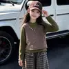Conjunto de Otoño para Niñas 2026 Nuevo Estilo Infantil Elegante Moderno Niña Pequeña Cuadros Dibujos Animados Casual Pantalones Cortos Conjunto de Tres Piezas