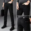 Novedad Otoño e Invierno 2026 Estilo Coreano Jeans Rectos Ajustados para Hombre de Algodón Puro Negro Elástico con Forro Polar y Engrosados, No se Desvanecen