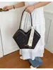 Bolsa de ombro feminina, bolsa de design nicho transfronteiriço, novo modelo 2026 bolsa de antebraço, bolsa sacola de ombro de alta qualidade para o dia a dia