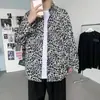 Camisa con estampado de leopardo en tonos oscuros, unisex, estilo coreano, top de diseño moderno, marca de streetwear americana, corte holgado, cárdigan fresco y elegante