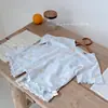 Algodón clase A apto para la piel Conjunto de dos piezas de verano para niños, top de manga corta y shorts, estampado de dibujos animados para bebé, ropa de casa transpirable