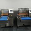 Máquina de inyección de pasteles de una cabeza doble cabeza máquina de relleno máquina de inyección de bizcocho de chiffon bizcocho esponjoso E600 equipo de automatización