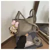 Bolsos de Mujer de Moda Este Año 2026 Nuevos Bolsos de Mano de Nicho Súper Populares con un Toque de Alta Gama Bolsos Versátiles de Hombro y Cruzados