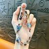 Nuevo llavero de mariposa estrellada con cuentas, cadena para teléfono móvil, combinación de colores del cielo estrellado, accesorios de corazón de niña, lote de regalo